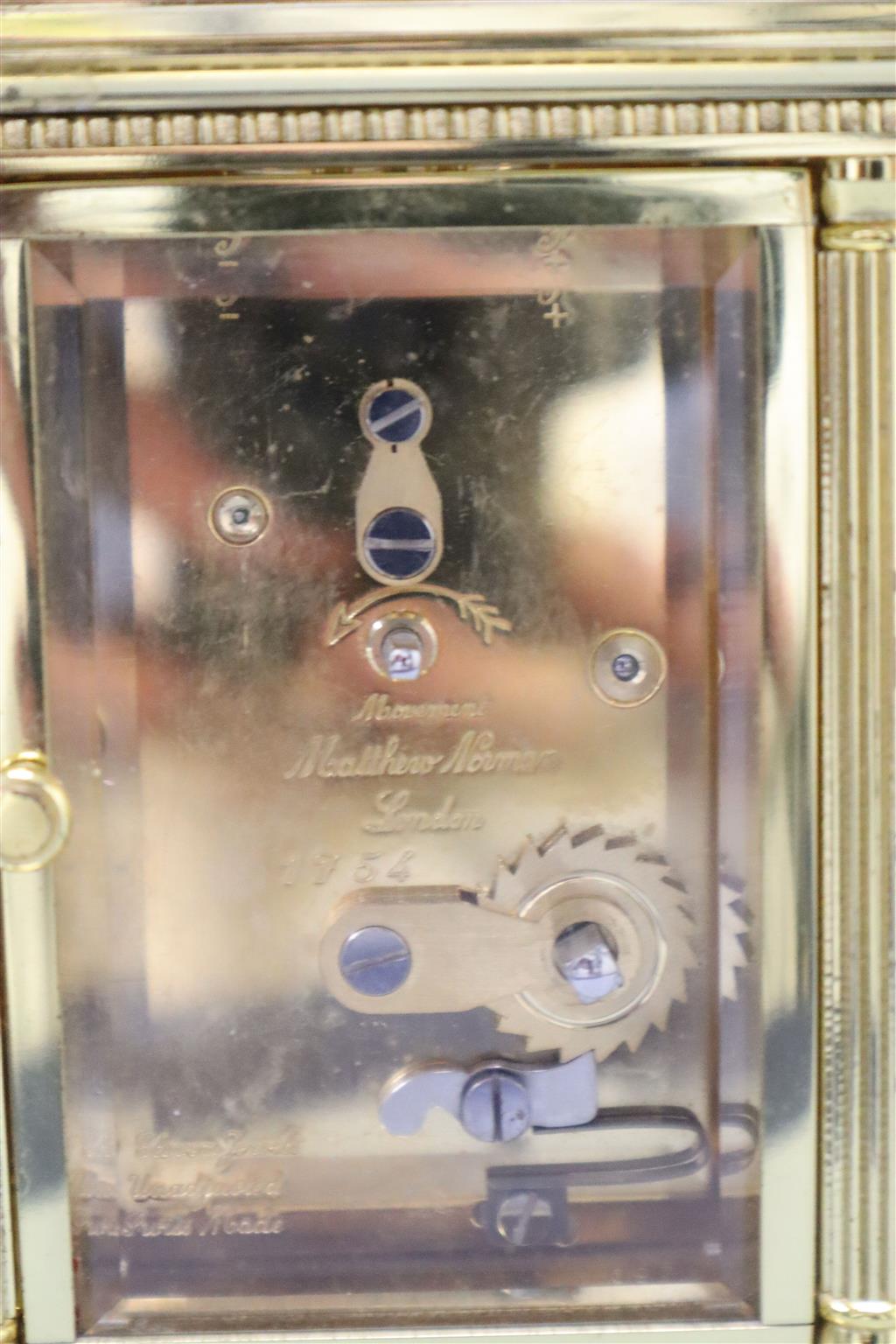 A Matthew Norman brass cased carriage timepiece, serial no.1754, height with handle down 13cm